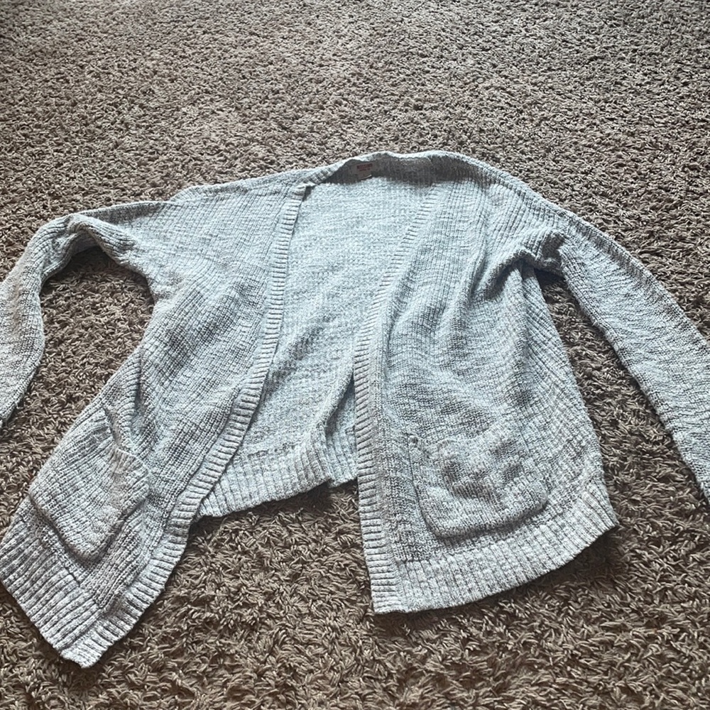 Light grey cardigan lightly worn